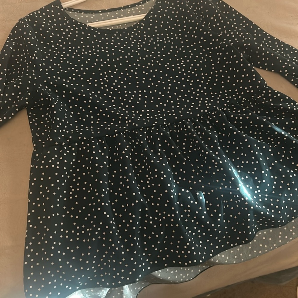 Green with white polka dots top
